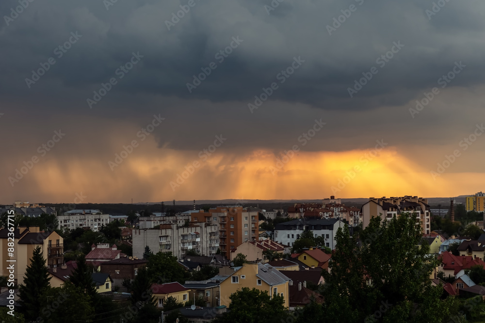 A storm is approaching over the city.Sunset stormy sky A storm is approaching over the city.Sunset stormy sky