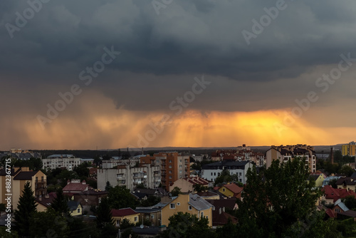 A storm is approaching over the city.Sunset stormy sky