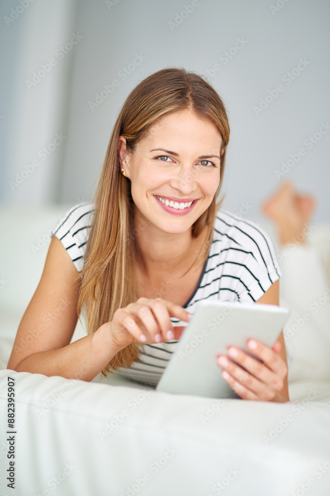 Woman, portrait smile and tablet for browsing with streaming film, playing online crossword and blog update in home. Happy lady, tech and post for social media, reading ebook and download game app Woman, portrait smile and tablet for browsing with streaming film, playing online crossword and blog update in home. Happy lady, tech and post for social media, reading ebook and download game app
