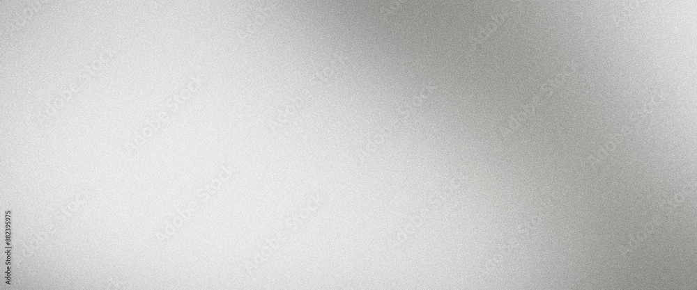 Metallic brushed surface with abstract background and a subtle grainy texture Metallic brushed surface with abstract background and a subtle grainy texture