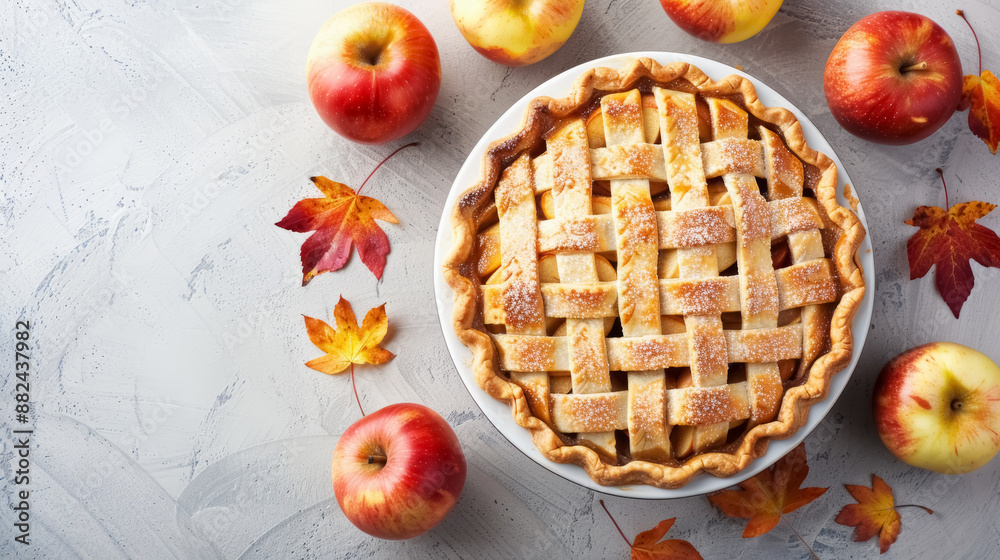 homemade apple pie surrounded by fresh autumn apples and leaves homemade apple pie surrounded by fresh autumn apples and leaves
