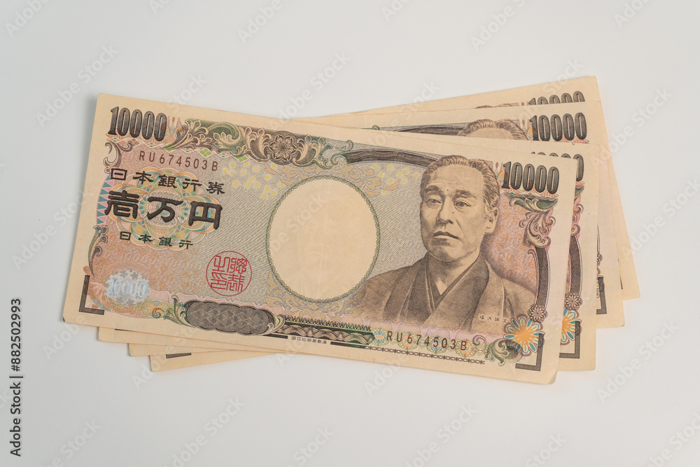 Japanese Yen banknote on white background Japanese Yen banknote on white background