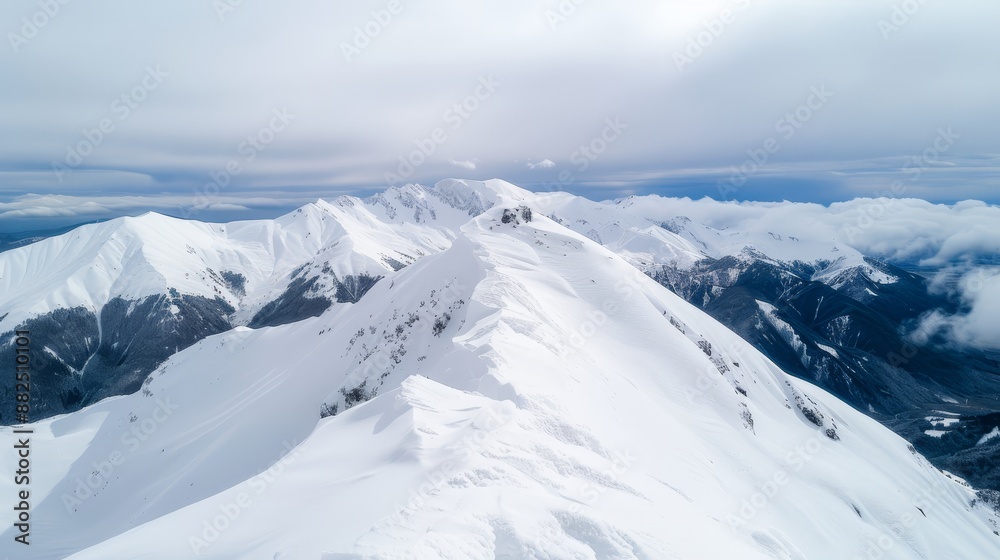 Snowy mountain landscape, the peaks covered in frost and ice, the freezing chill of winter evident in the breathtaking scenery Snowy mountain landscape, the peaks covered in frost and ice, the freezing chill of winter evident in the breathtaking scenery