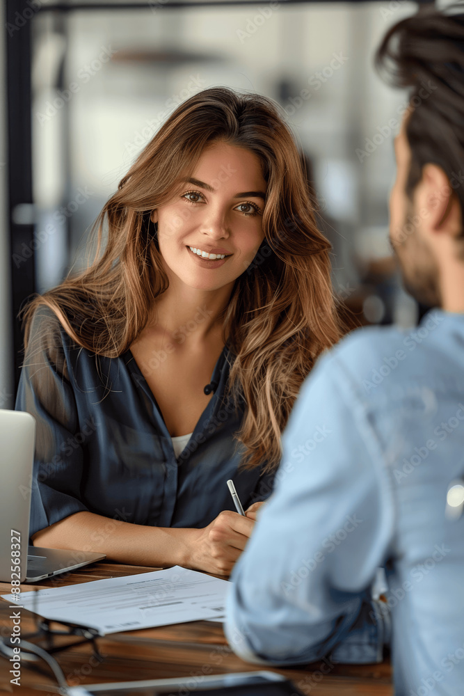 Professional Business Meeting with Female Manager and Male Colleague Discussing Work and Strategy at Modern Office Desk Professional Business Meeting with Female Manager and Male Colleague Discussing Work and Strategy at Modern Office Desk