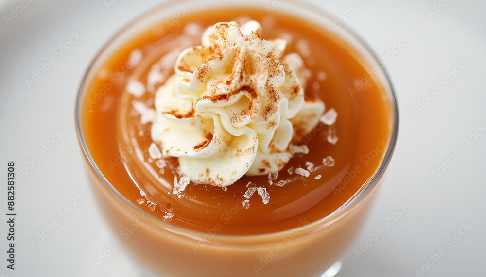 creamy butterscotch pudding, featuring a smooth, rich texture with a glossy caramel color, topped with a dollop of whipped cream creamy butterscotch pudding, featuring a smooth, rich texture with a glossy caramel color, topped with a dollop of whipped cream