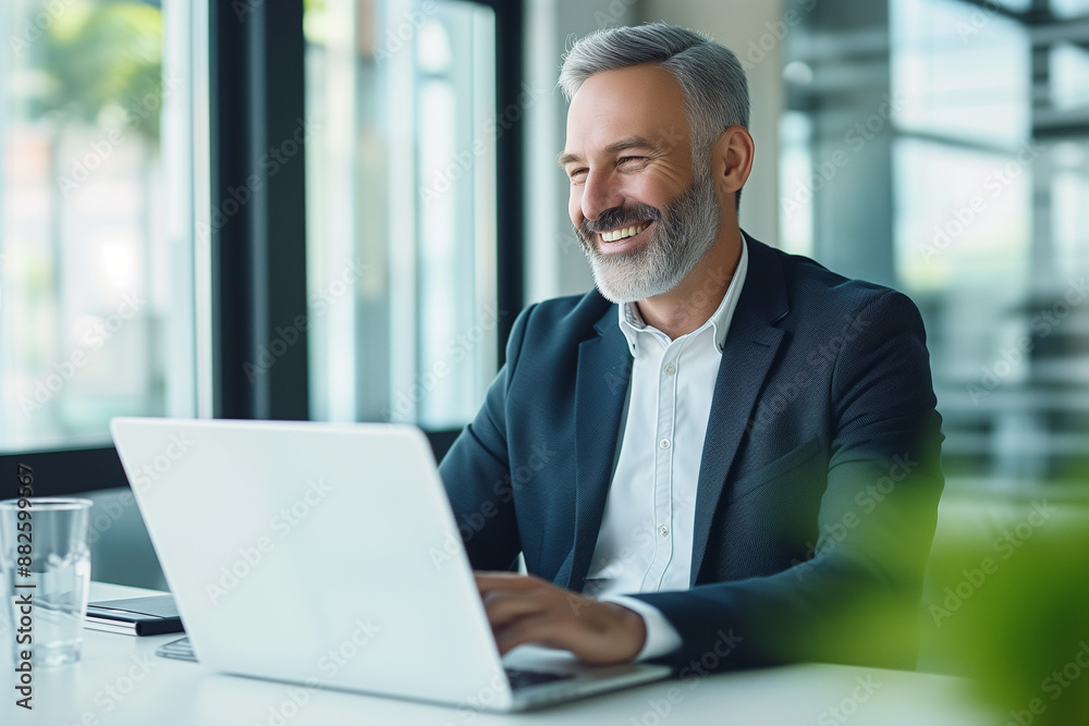 businessman working on laptop for video conference meeting joyful and happy photo