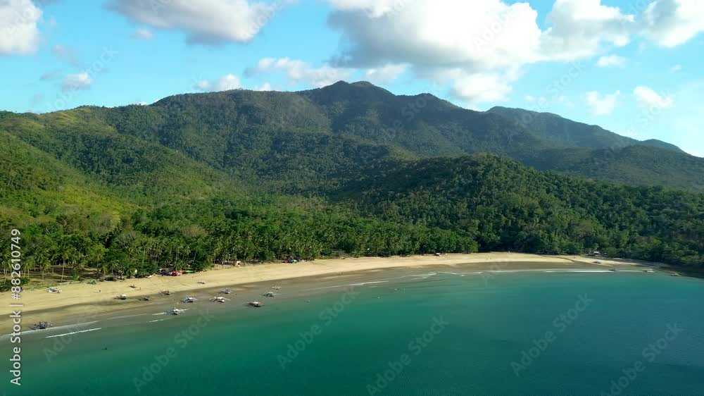 Discover the breathtaking Nagtabon Beach in Bacungan, Palawan, through this stunning drone rotation. The footage offers a panoramic view of the pristine beach flanked by lush mountains, capturing the Discover the breathtaking Nagtabon Beach in Bacungan, Palawan, through this stunning drone rotation. The footage offers a panoramic view of the pristine beach flanked by lush mountains, capturing the
