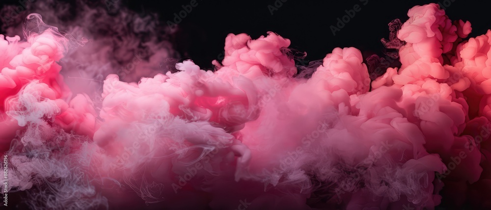 Fototapeta premium Pastel puff, magenta and pink ink smoke cloud illustration against a dark background, a delicate and dreamy visual