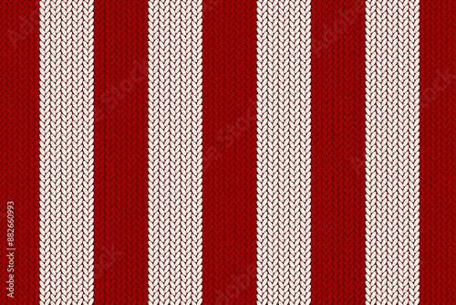 Texture of knitted fabric. Cozy red and white striped knitting pattern
