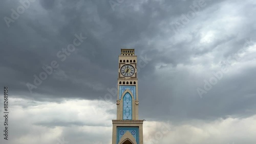 View of the big clock tower with on Shakhristan Square in Taraz city photo