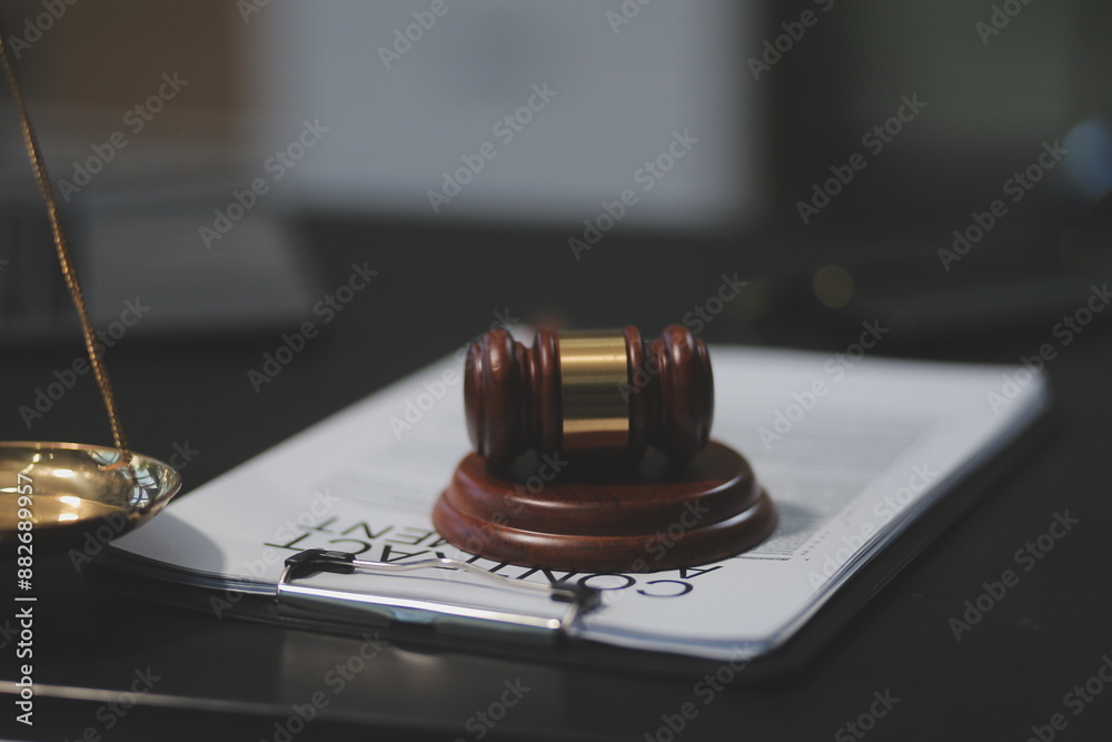 female business woman lawyers working at the law firms. Judge gavel with scales of justice. Legal law, lawyer, documents, advice and justice concept.