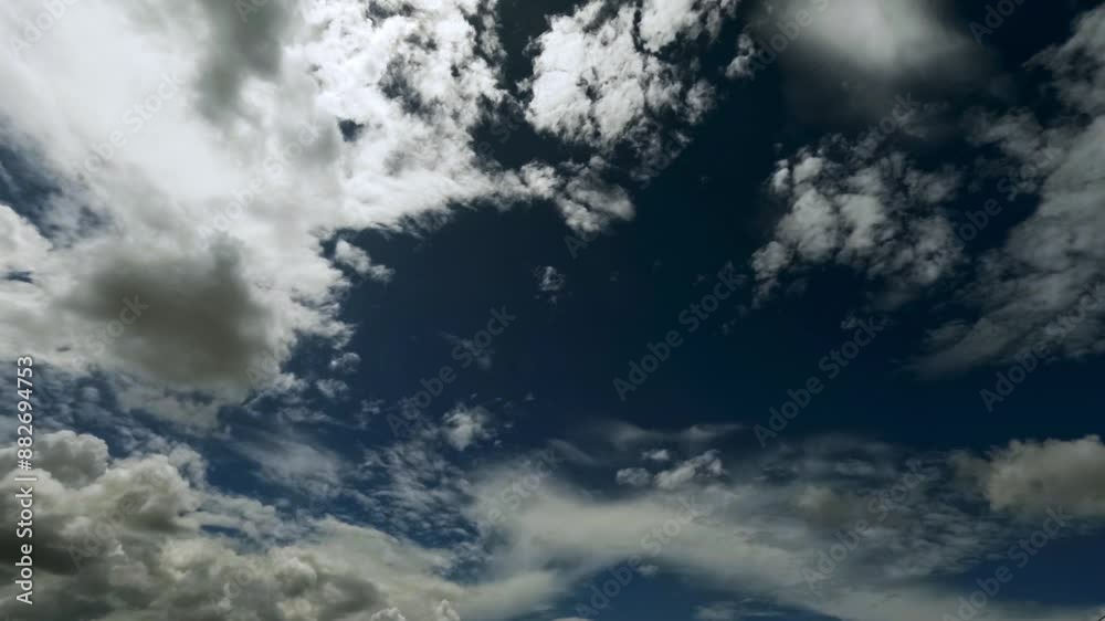 Dramatic Cloudy Sky with Sunlight Breaks Time Lapse Background. Blue Sky White Clouds. Summer Blue Sky Timelapse. Nature Weather Blue Sky and White Clouds 4k Dramatic Cloudy Sky with Sunlight Breaks Time Lapse Background. Blue Sky White Clouds. Summer Blue Sky Timelapse. Nature Weather Blue Sky and White Clouds 4k