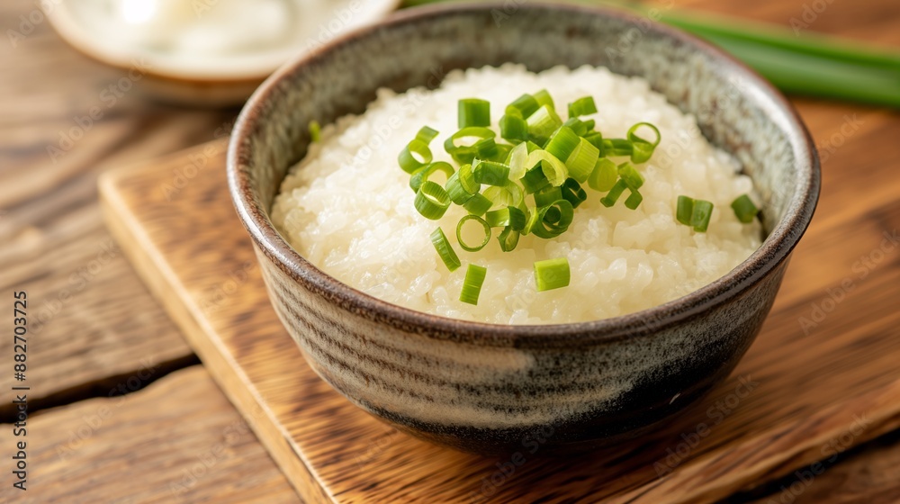 Food for convalescent patients, A small bowl of rice porridge with finely chopped green onions and a dash of soy sauce Food for convalescent patients, A small bowl of rice porridge with finely chopped green onions and a dash of soy sauce