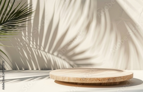 Wooden Podium With Palm Leaf  Sunlight Shadow on White Wall Background for Product Display