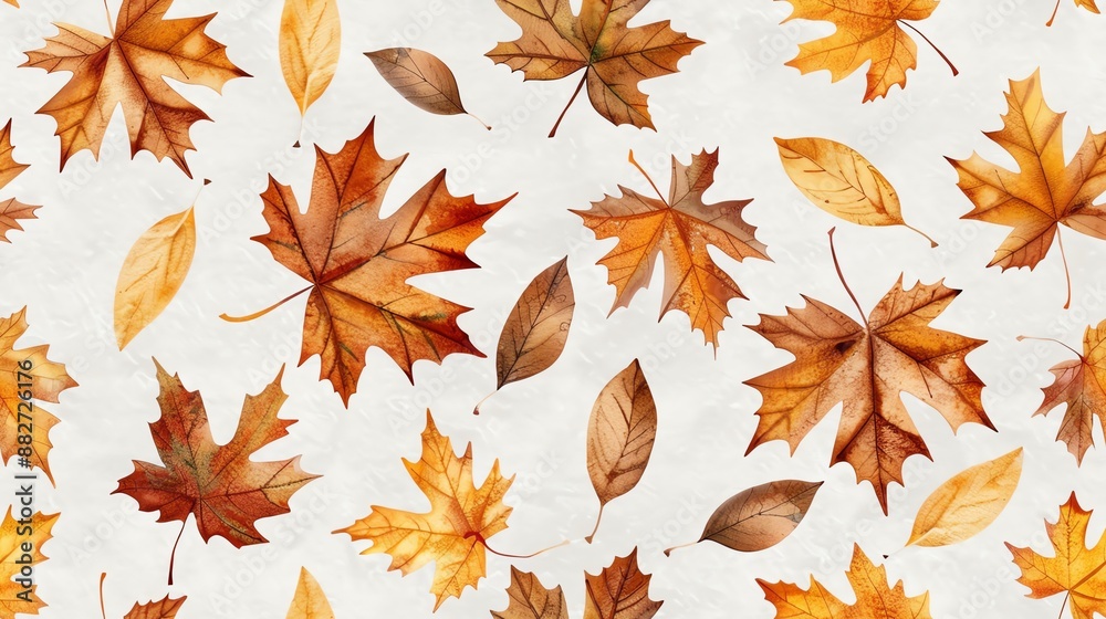 Fototapeta premium Seamless pattern of autumn leaves in shades of orange, yellow, and brown, perfect for seasonal design projects and fall-themed backgrounds.