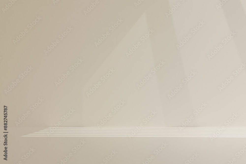 A light shining on a wall with a beige background. A light shining on a wall with a beige background.