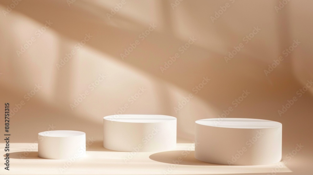 Three White Cylindrical Podiums Three White Cylindrical Podiums