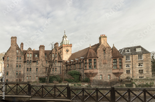 Well Court is a traditional old Tenement building in Dean Village which sits along the banks of the Water of Leith. Space for text, Selective focus. photo