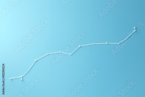 Photo of A graph going up on blue background, representing an upward trend in sales or ARCHxaa style. Minimalist flat lay photography. White line drawing of the growth curve with dots and arrows, simp photo