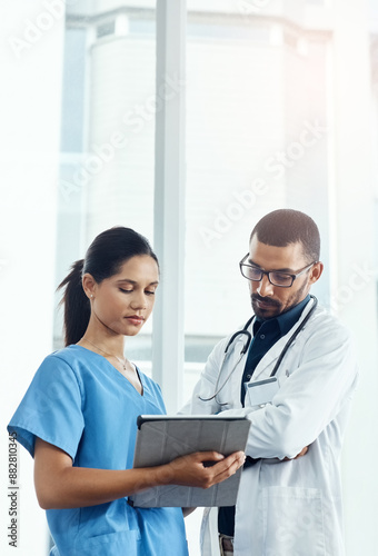 Team, doctor and nurse on tablet for planning, discussion and healthcare in clinic. Tech, collaboration and medical people in hospital for reading research, patient results or help with online report photo