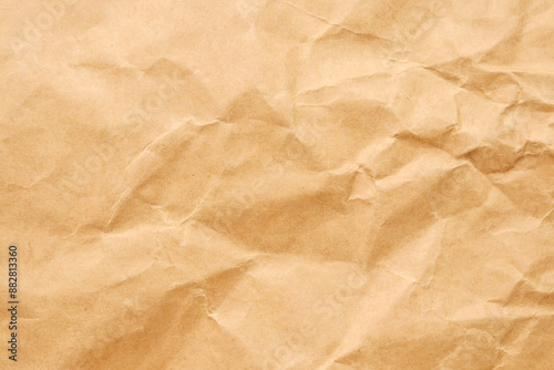 Abstract crumpled and creased recycle brown paper texture background