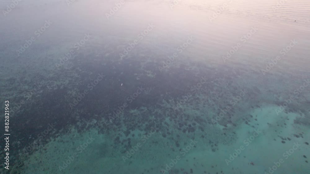 Tilt drone camera people chilling and partying on a zen beach in Koh Phangan Tilt drone camera people chilling and partying on a zen beach in Koh Phangan