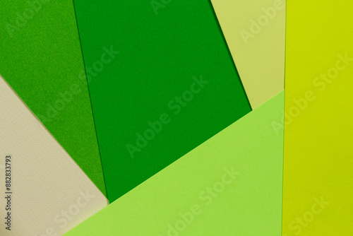Colorful card board sheets layout in greens shades.