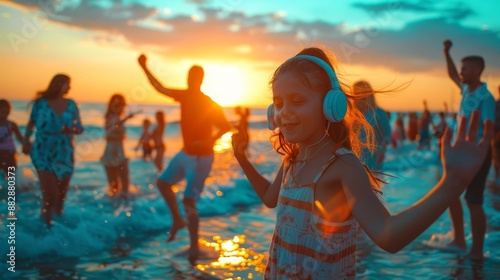 A silent disco on the beach with family members dancing to their favorite holiday tunes photo