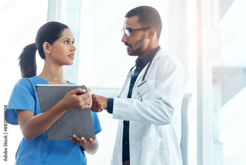 Medical, research or tablet with doctor and nurse in hospital for collaboration, diagnosis or discussion. Consulting, healthcare or feedback with medicine professional man and woman in clinic Medical, research or tablet with doctor and nurse in hospital for collaboration, diagnosis or discussion. Consulting, healthcare or feedback with medicine professional man and woman in clinic