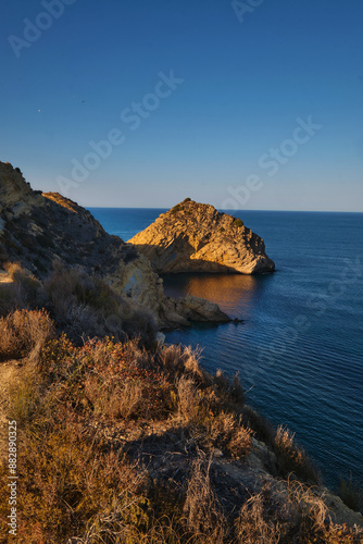 rocky bay calm blue sea