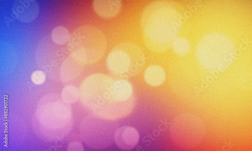 Colorful bokeh effect on blurred background with abstract grainy texture