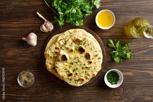 Photos Homemade indian naan bread with garlic butter