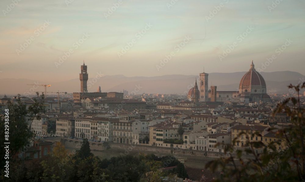 Fototapeta premium Cityscape of Florence against dusk sky at sunset in Tuscany region, Italy