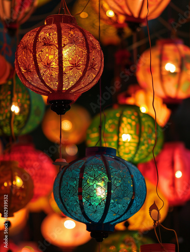 Diwali festival. Indian festival of lights. Many colorful burning holiday lanterns. Bright multi-colored traditional Indian lanterns with ornaments. Night, bright holiday garlands.  photo
