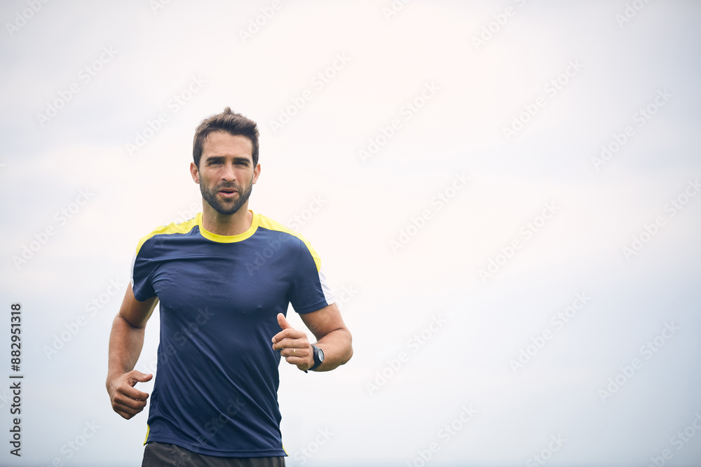 Running, cloudy sky and portrait of man with fitness challenge, wellness and outdoor exercise. Training, cardio and runner in nature with mockup, health progress and athlete in morning muscle workout Running, cloudy sky and portrait of man with fitness challenge, wellness and outdoor exercise. Training, cardio and runner in nature with mockup, health progress and athlete in morning muscle workout