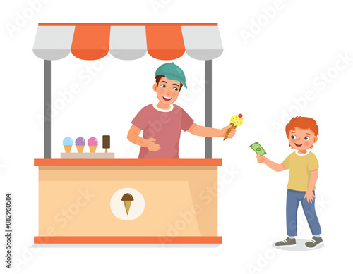 cute little boy buying ice cream from cart
