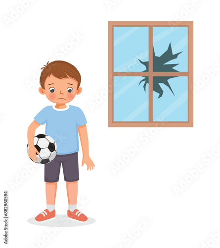 Cute little boy broke window glass with ball feeling guilty