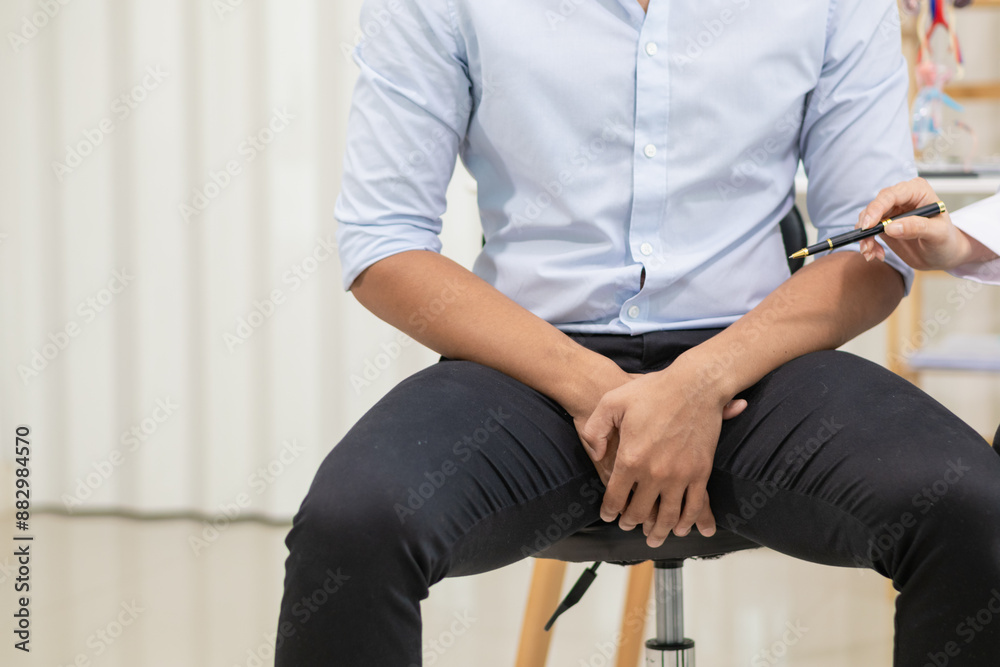 Fototapeta premium A young man was diagnosed with a tumor in his prostate and the medical team diagnosed him with prostate cancer and provided counseling to health care patients to undergo cancer treatment and surgery.