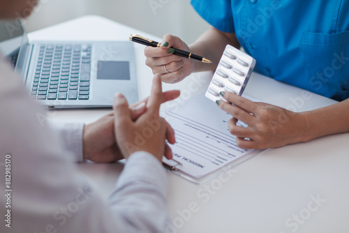 A young man was diagnosed with a tumor in his prostate and the medical team diagnosed him with prostate cancer and provided counseling to health care patients to undergo cancer treatment and surgery. photo