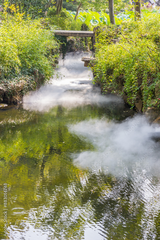 Fog on the water in the humble administrators garden in Suzhou, China
