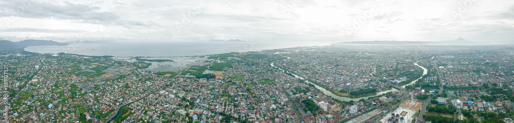 Aerial drone view of cityscape scenery in Banda Aceh, Aceh, Indonesia. Aerial drone view of cityscape scenery in Banda Aceh, Aceh, Indonesia.
