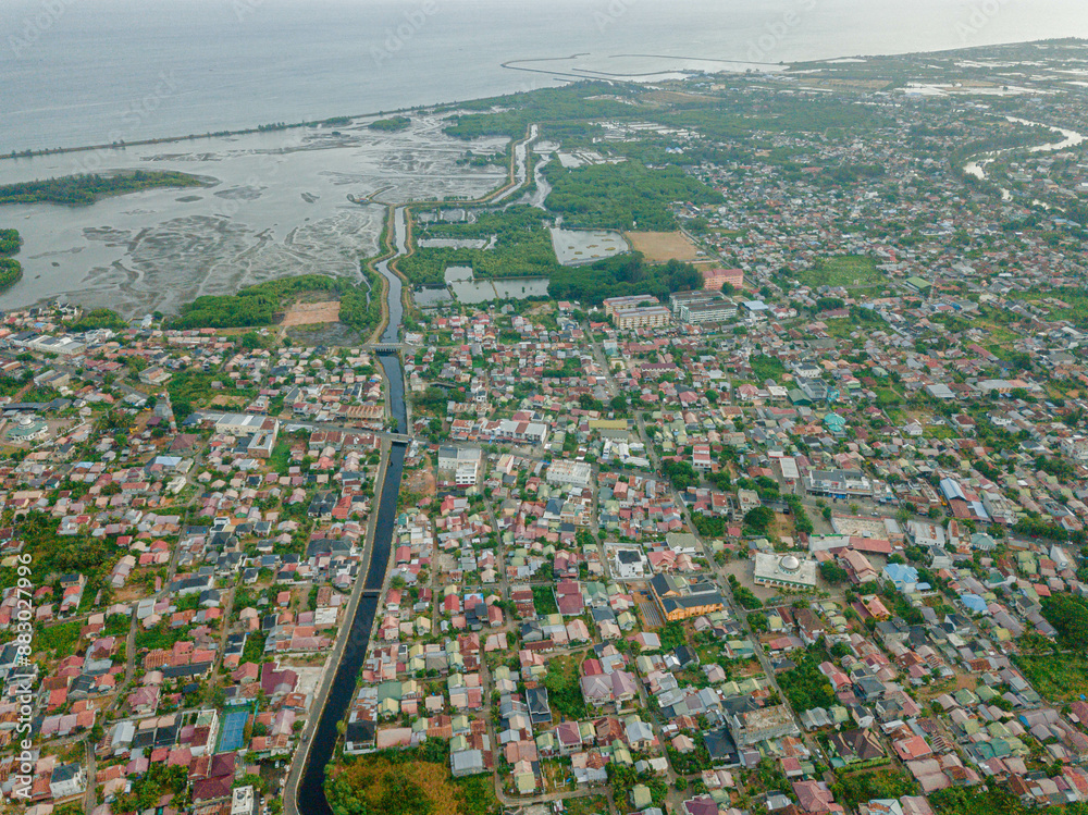 Fototapeta premium Aerial drone view of big city skyline scenery in Banda Aceh, Aceh, Indonesia.
