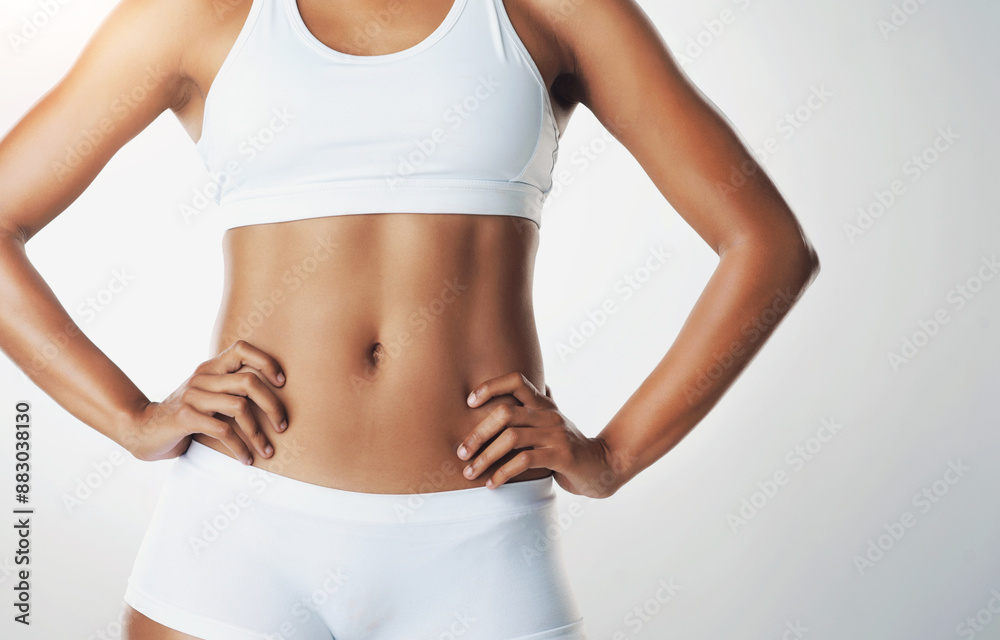Fitness, underwear and stomach of woman in studio for weight loss, wellness and exercise on white background. Skincare, health and isolated abdomen of person for workout, diet and slim figure Fitness, underwear and stomach of woman in studio for weight loss, wellness and exercise on white background. Skincare, health and isolated abdomen of person for workout, diet and slim figure