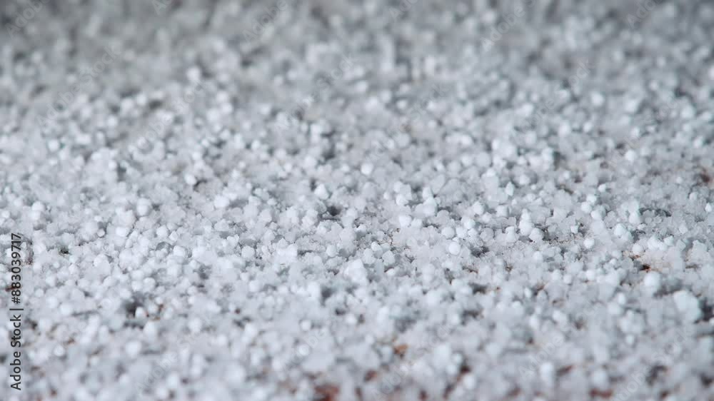 Hail falling at night close-up view Hail falling at night close-up view