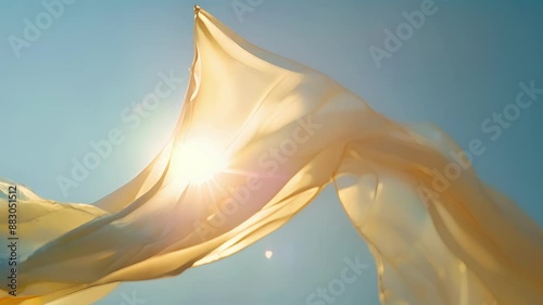 With each gust of wind the silk fabric performs a delicate ballet twirling and spinning in the air.