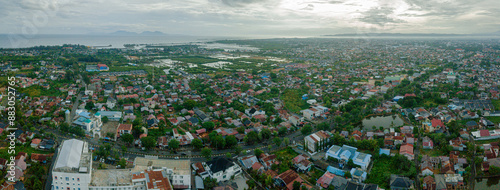 Panoramic aerial drone view of big city skyline scenery in Banda Aceh, Aceh, Indonesia. photo