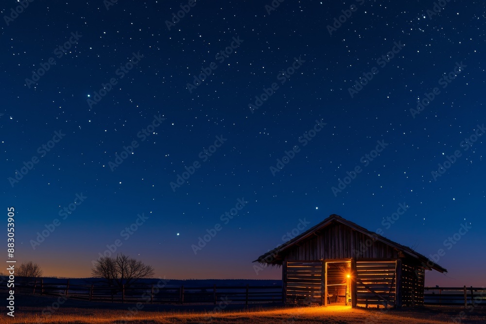 A rustic wooden stable with an open door stands illuminated by candlelight, under a vibrant sky filled with stars A rustic wooden stable with an open door stands illuminated by candlelight, under a vibrant sky filled with stars