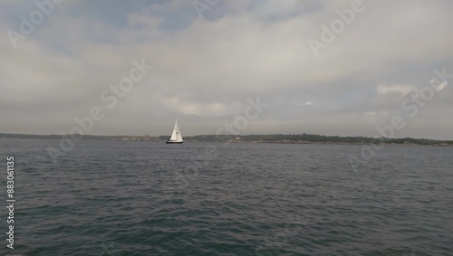 sailboat sailing on the bay