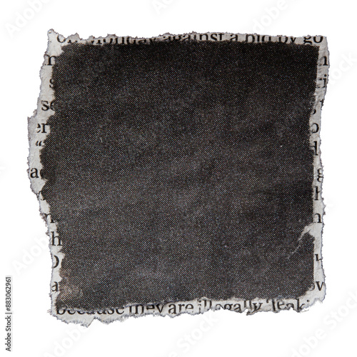 Torn black square shaped newspaper photo