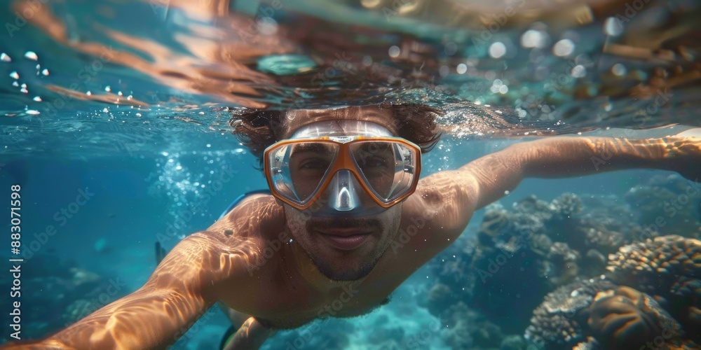 Fototapeta premium handsome man snorkeling underwater. ai generated